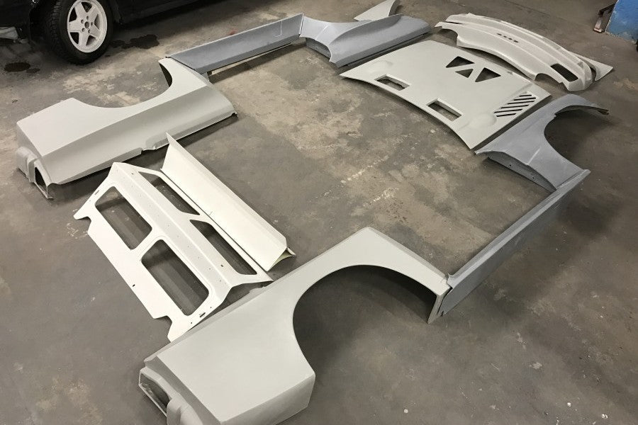 B - SPORT QUATTRO S1 E2 KIT DE CARROCERÍA