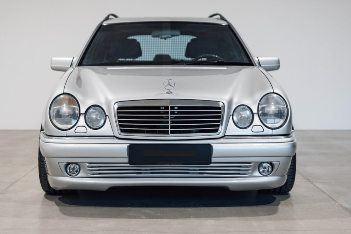 E - W210 DEFENSA DELANTERA