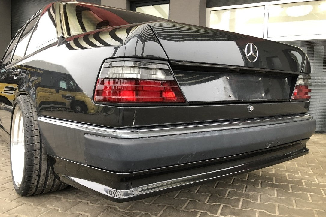 E - W124 KAMEI DEFENSA TRASERA